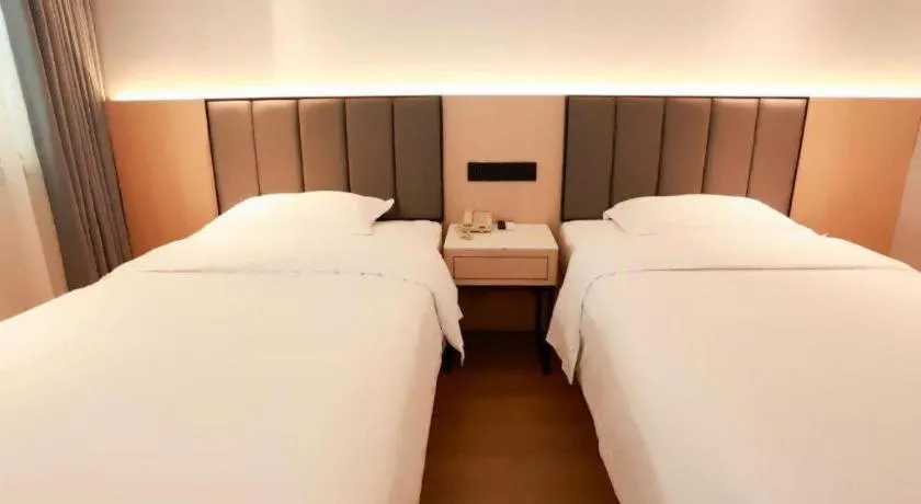 Bed in GreenTree Inn Maanshan Hanshan District Jiuwu Square Hotel