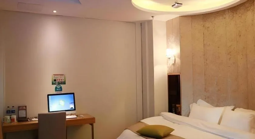 Bed in GreenTree Inn Maanshan Hanshan District Jiuwu Square Hotel