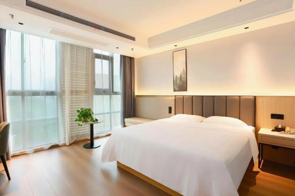 Bed in GreenTree Inn Maanshan Hanshan District Jiuwu Square Hotel