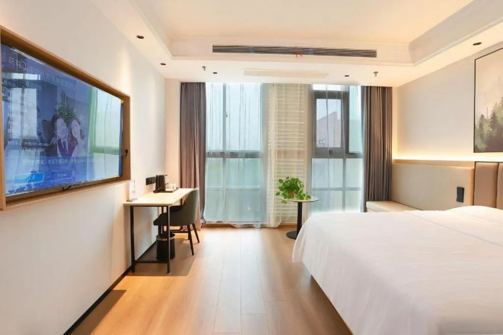 Bed in GreenTree Inn Maanshan Hanshan District Jiuwu Square Hotel