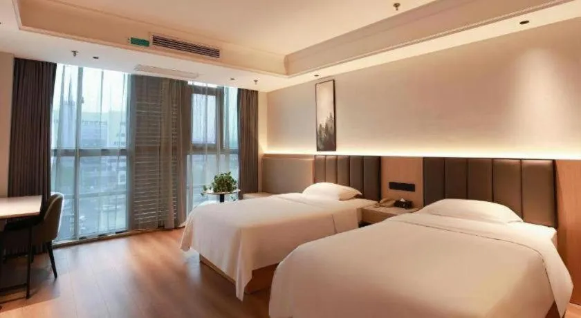 Bed in GreenTree Inn Maanshan Hanshan District Jiuwu Square Hotel