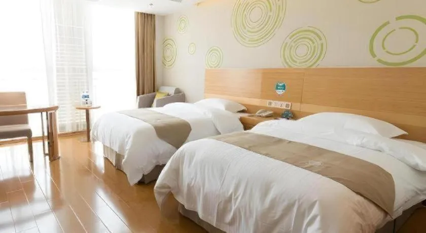 Bed in GreenTree Inn Maanshan Hanshan District Jiuwu Square Hotel