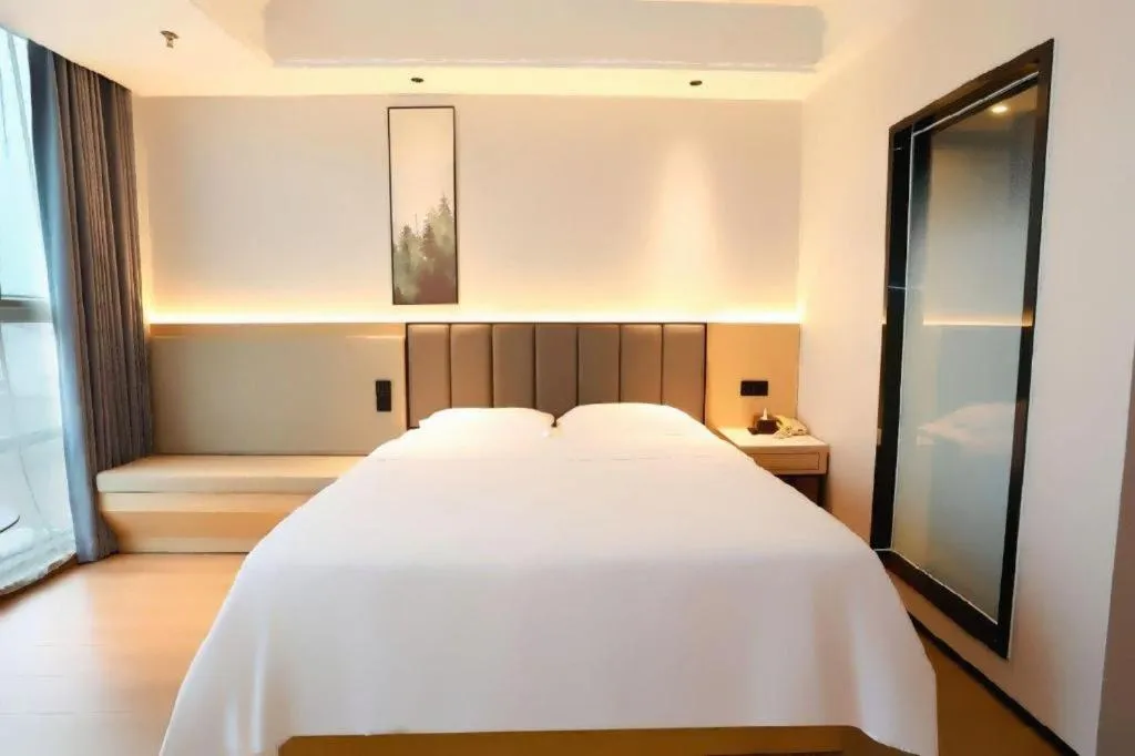 Bed in GreenTree Inn Maanshan Hanshan District Jiuwu Square Hotel