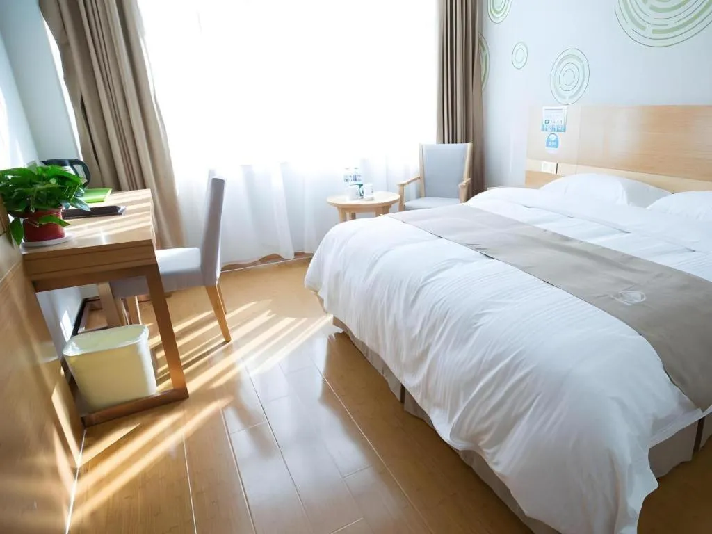 Bed in GreenTree Inn Maanshan Hanshan District Jiuwu Square Hotel