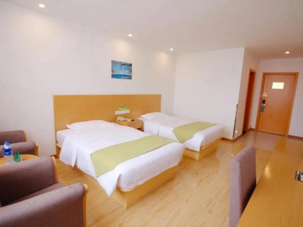 Bed in GreenTree Alliance Suzhou Zhangjiagang Nanfeng Town Hotel