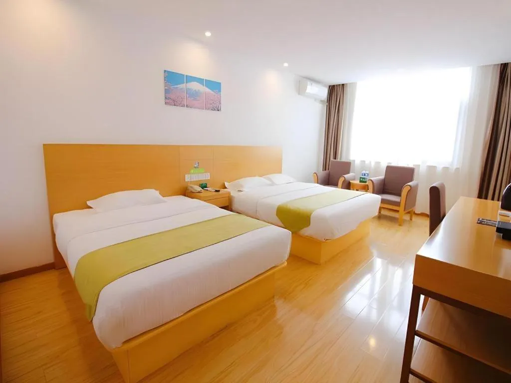 Bed in GreenTree Alliance Suzhou Zhangjiagang Nanfeng Town Hotel