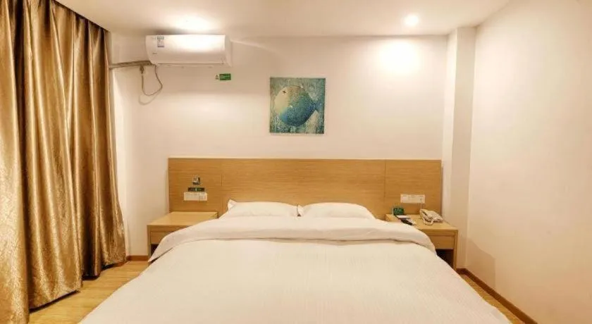 Bed in GreenTree Alliance Suzhou Zhangjiagang Nanfeng Town Hotel