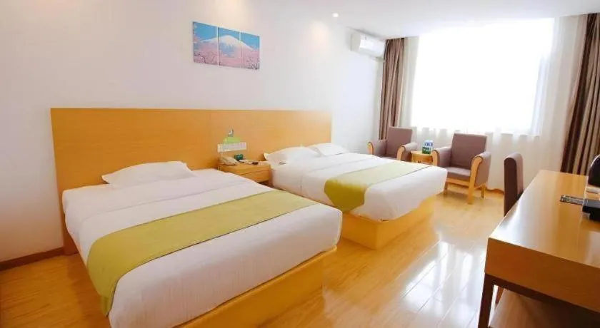 Bed in GreenTree Alliance Suzhou Zhangjiagang Nanfeng Town Hotel