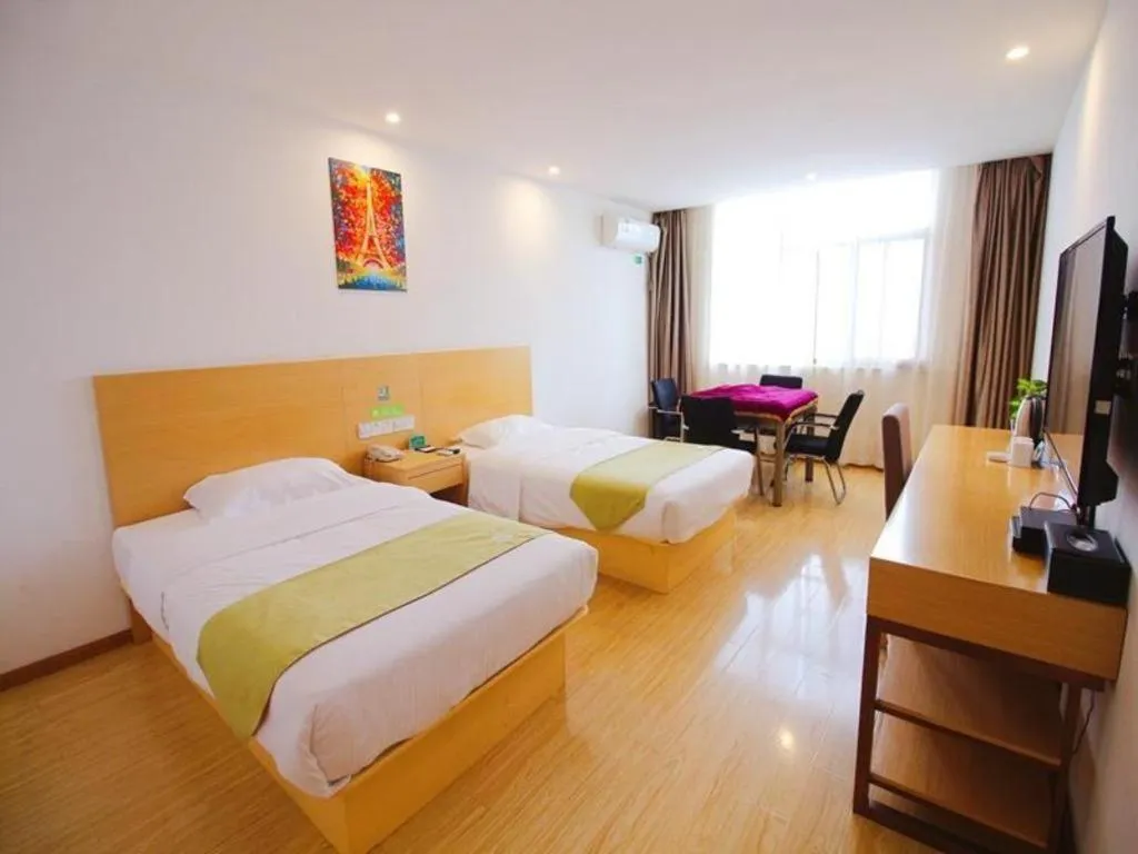 Bed in GreenTree Alliance Suzhou Zhangjiagang Nanfeng Town Hotel