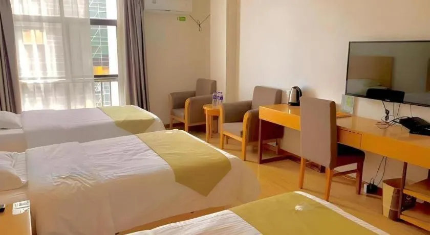 Bed in GreenTree Alliance Suzhou Zhangjiagang Nanfeng Town Hotel