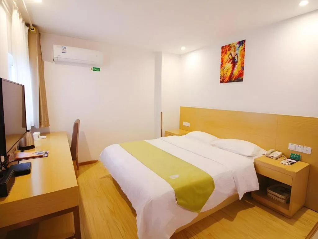 Bed in GreenTree Alliance Suzhou Zhangjiagang Nanfeng Town Hotel