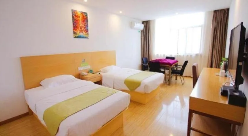 Bed in GreenTree Alliance Suzhou Zhangjiagang Nanfeng Town Hotel