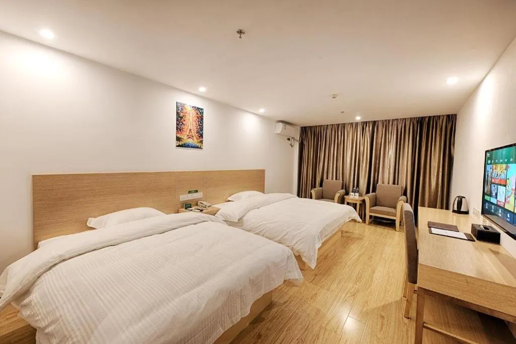 Bed in GreenTree Alliance Suzhou Zhangjiagang Nanfeng Town Hotel