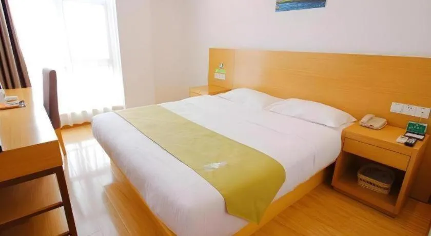 Bed in GreenTree Alliance Suzhou Zhangjiagang Nanfeng Town Hotel
