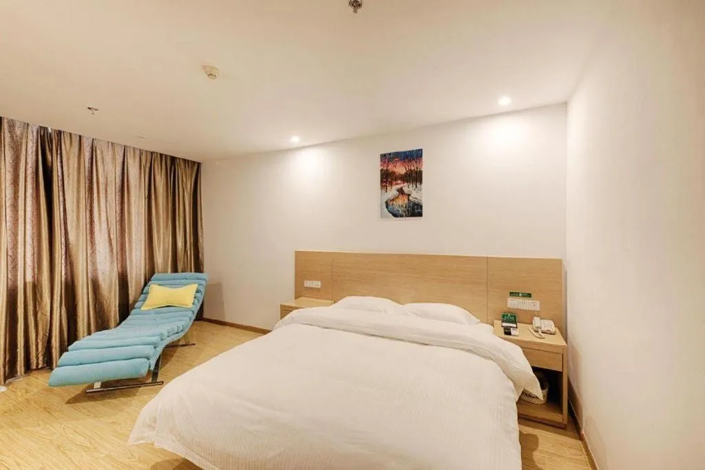 Bed in GreenTree Alliance Suzhou Zhangjiagang Nanfeng Town Hotel