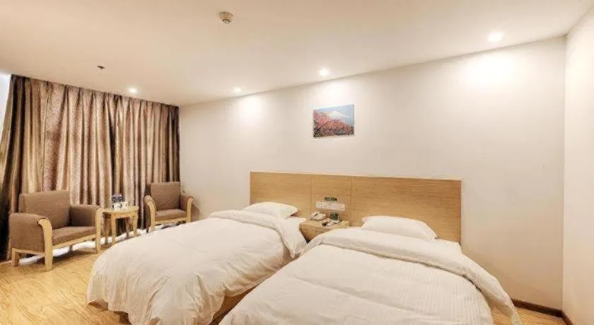 Bed in GreenTree Alliance Suzhou Zhangjiagang Nanfeng Town Hotel