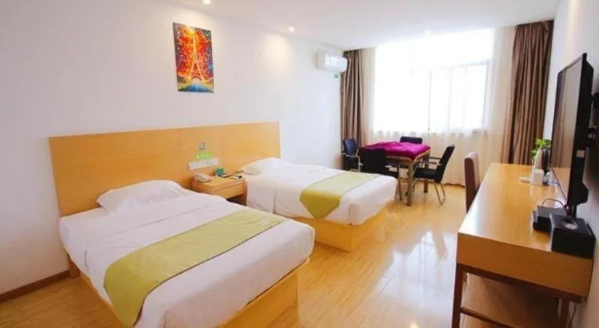 Bed in GreenTree Alliance Suzhou Zhangjiagang Nanfeng Town Hotel