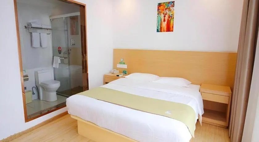 Bed in GreenTree Alliance Suzhou Zhangjiagang Nanfeng Town Hotel