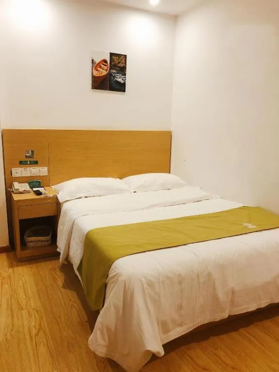 Bed in GreenTree Alliance Suzhou Zhangjiagang Nanfeng Town Hotel