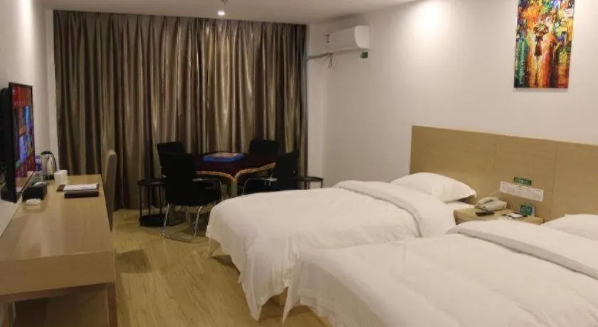 Bed in GreenTree Alliance Suzhou Zhangjiagang Nanfeng Town Hotel