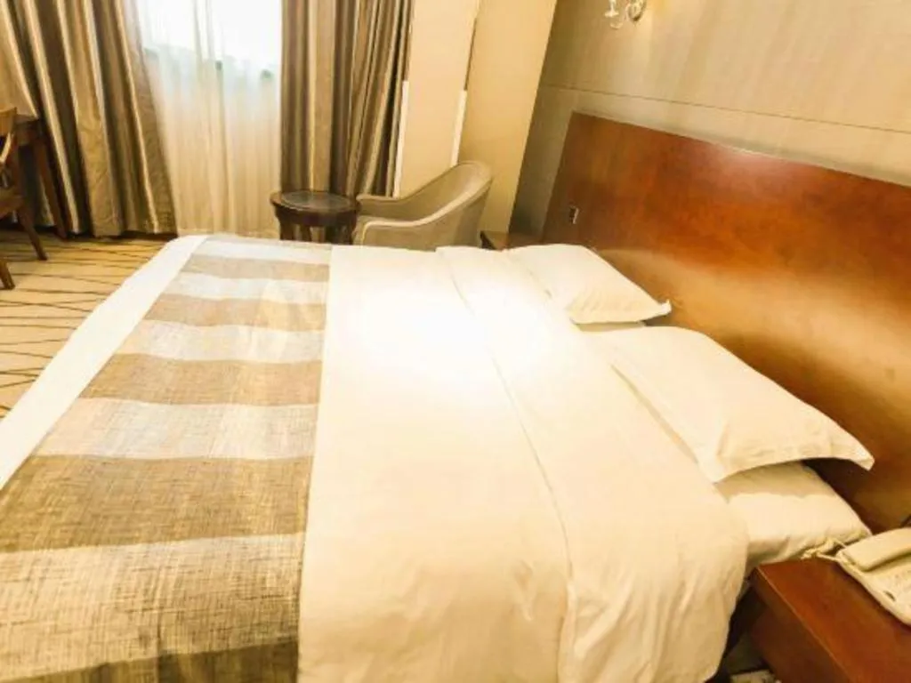 Bed in GreenTree Alliance Disneyland North Gate