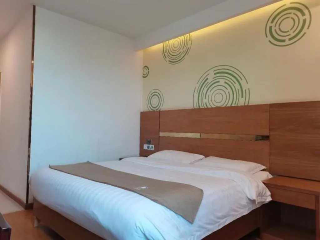 Bed in GreenTree Inn Fuzhou Eastern Capital Express Hotel