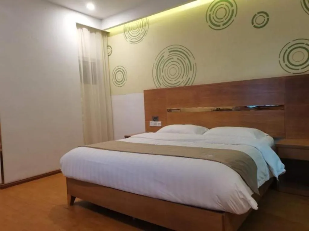 Bed in GreenTree Inn Fuzhou Eastern Capital Express Hotel