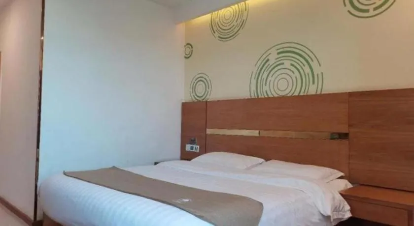 Bed in GreenTree Inn Fuzhou Eastern Capital Express Hotel