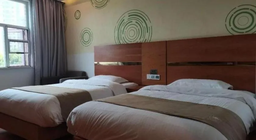 Bed in GreenTree Inn Fuzhou Eastern Capital Express Hotel
