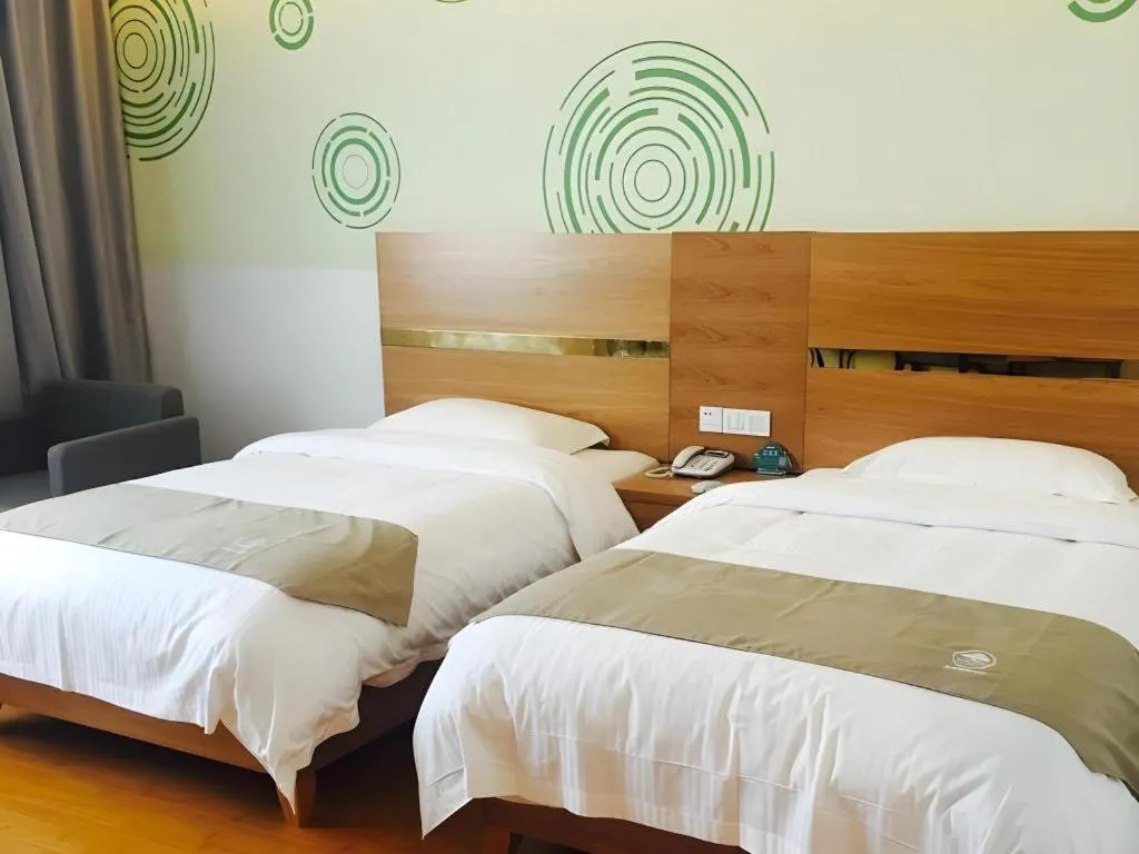 Bed in GreenTree Inn Fuzhou Eastern Capital Express Hotel