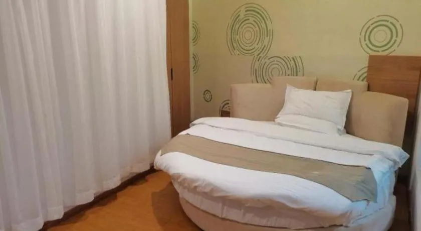 Bed in GreenTree Inn Fuzhou Eastern Capital Express Hotel