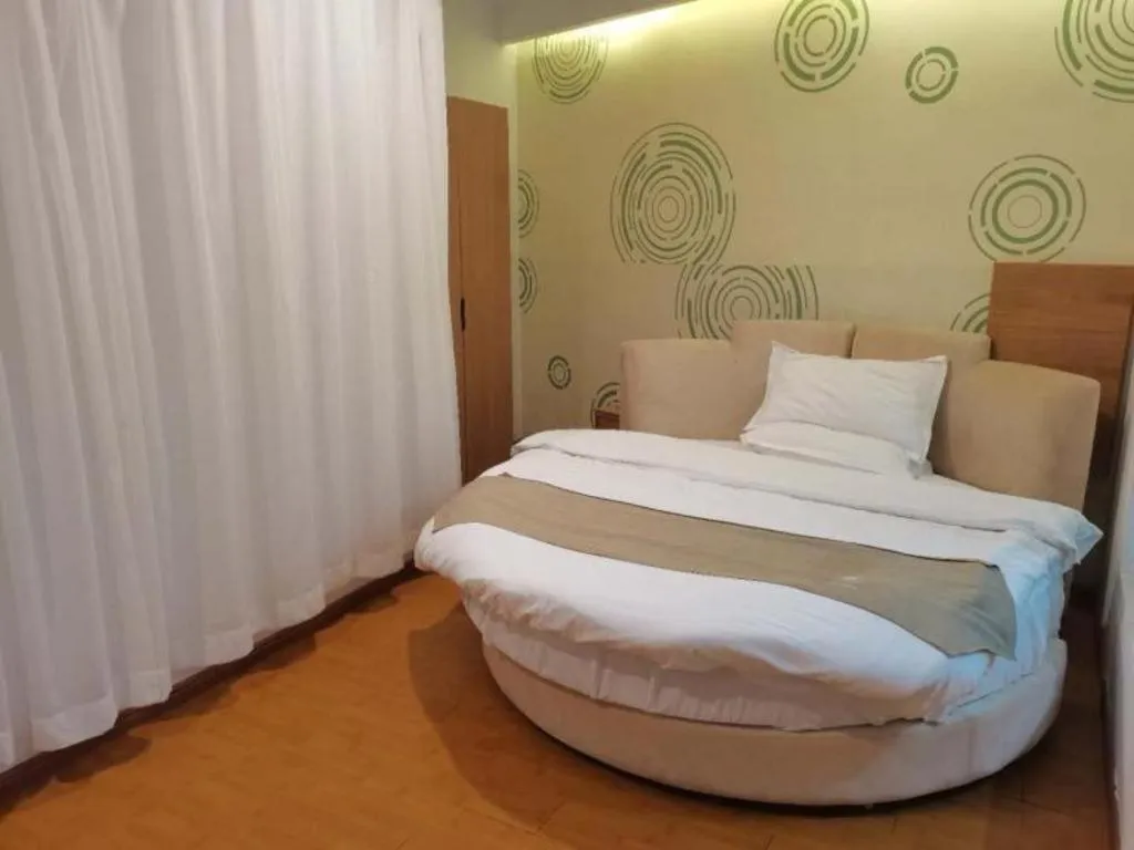 Bed in GreenTree Inn Fuzhou Eastern Capital Express Hotel