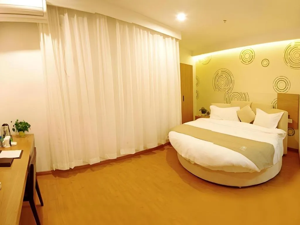 Bed in GreenTree Inn Fuzhou Eastern Capital Express Hotel