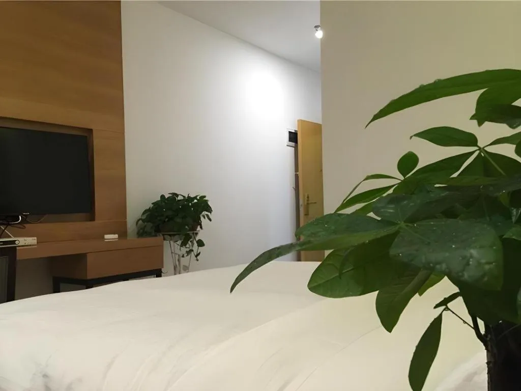 Bed in GreenTree Inn Fuzhou Eastern Capital Express Hotel