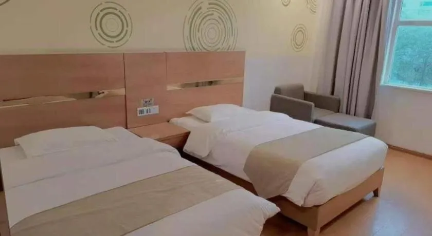 Bed in GreenTree Inn Fuzhou Eastern Capital Express Hotel