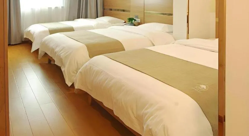 Bed in GreenTree Inn Fuzhou Eastern Capital Express Hotel
