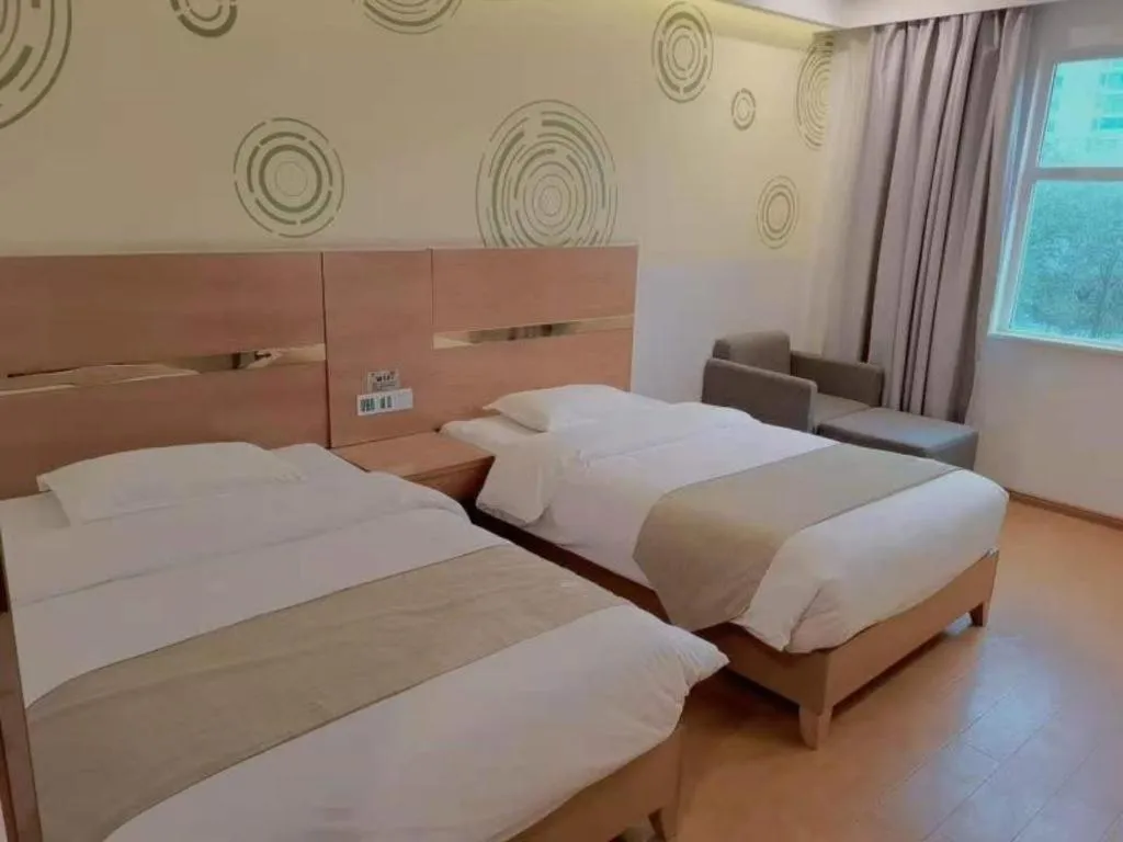 Bed in GreenTree Inn Fuzhou Eastern Capital Express Hotel