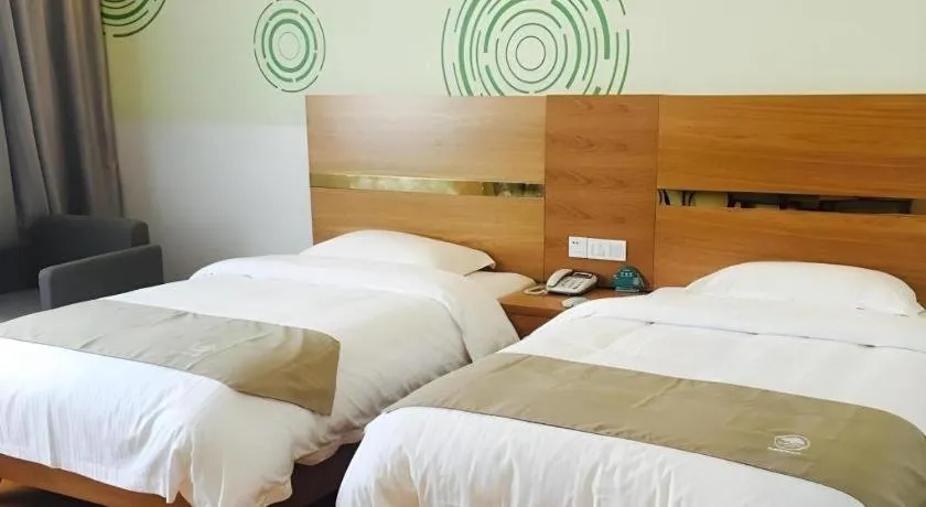 Bed in GreenTree Inn Fuzhou Eastern Capital Express Hotel