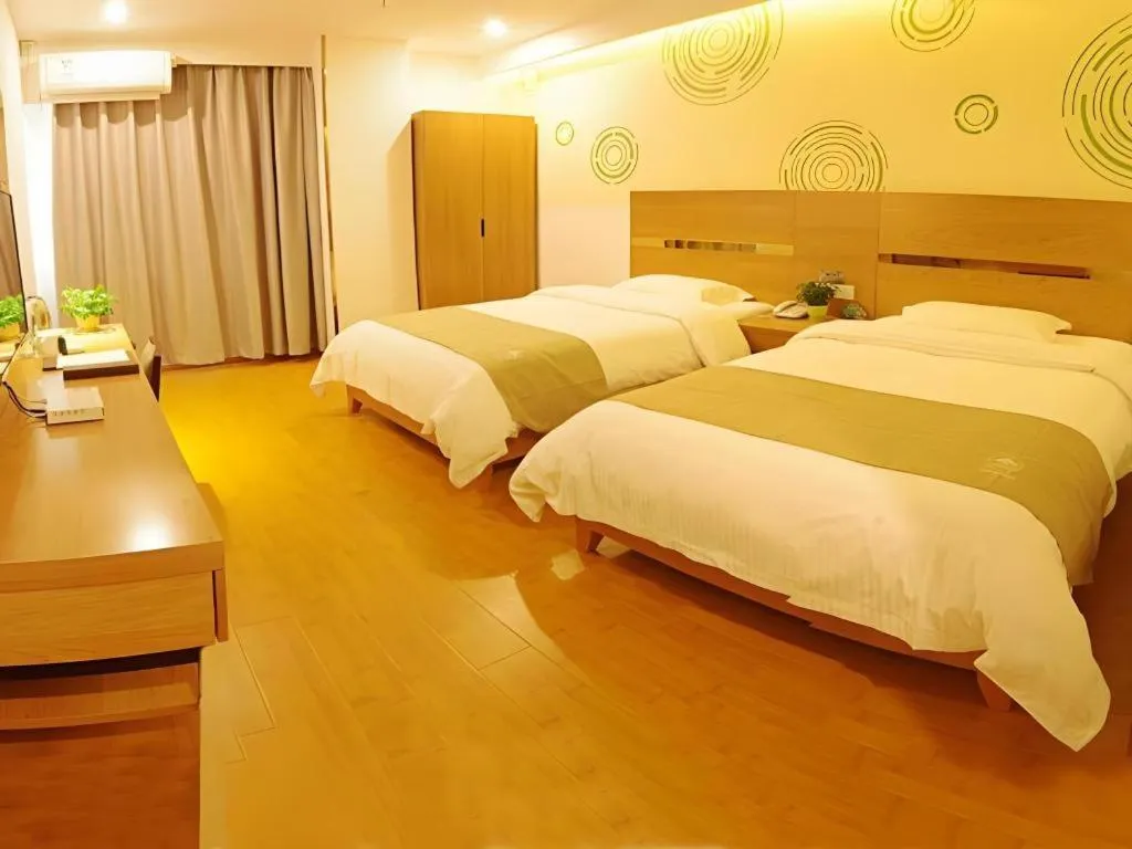 Bed in GreenTree Inn Fuzhou Eastern Capital Express Hotel