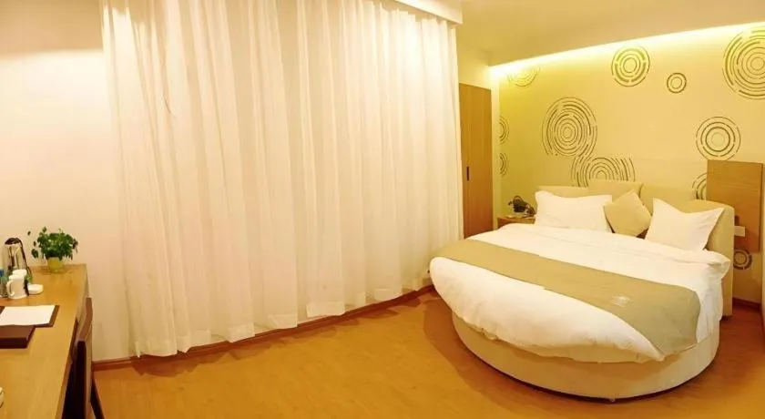 Bed in GreenTree Inn Fuzhou Eastern Capital Express Hotel
