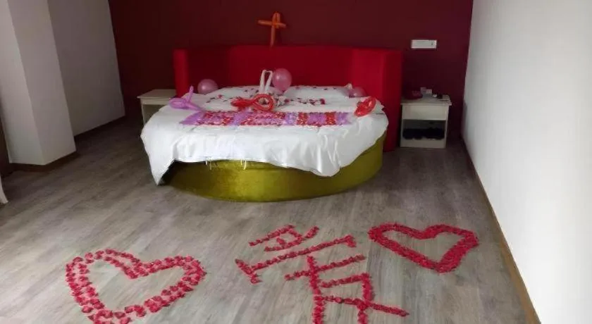 Bed in JUNYI Hotel Jiangxi Xinyu Baoshi Park