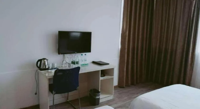 Bed in JUNYI Hotel Jiangxi Xinyu Baoshi Park