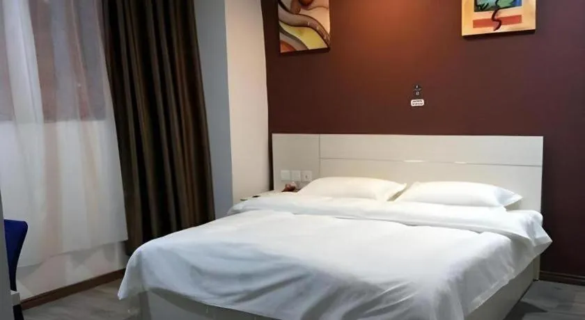 Bed in JUNYI Hotel Jiangxi Xinyu Baoshi Park