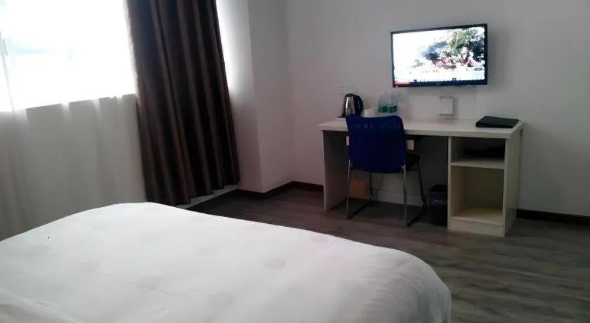 Bed in JUNYI Hotel Jiangxi Xinyu Baoshi Park