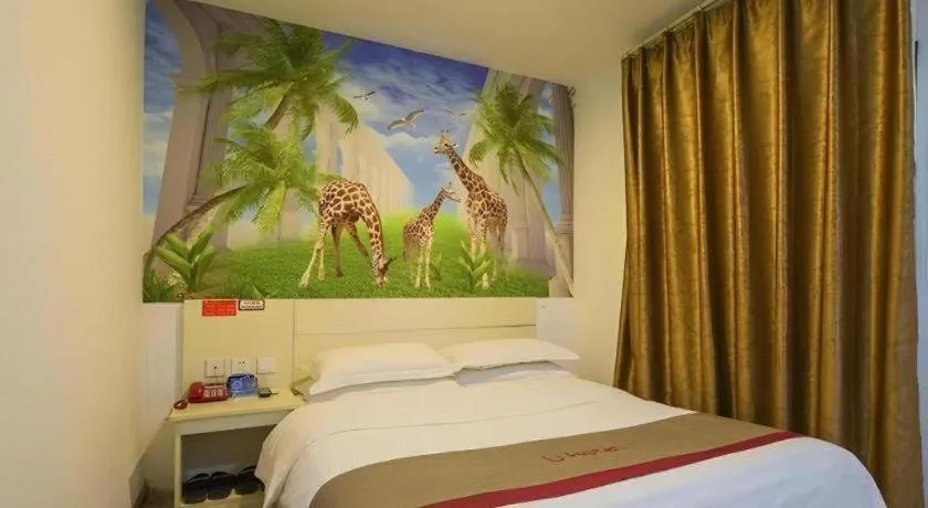 Bed in JUNYI Hotel Jiangxi Xinyu Baoshi Park