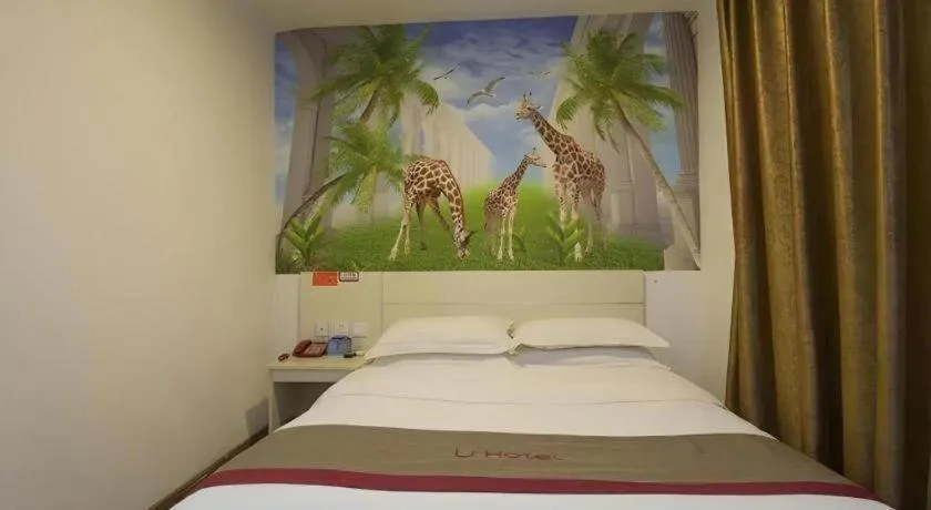 Bed in JUNYI Hotel Jiangxi Xinyu Baoshi Park