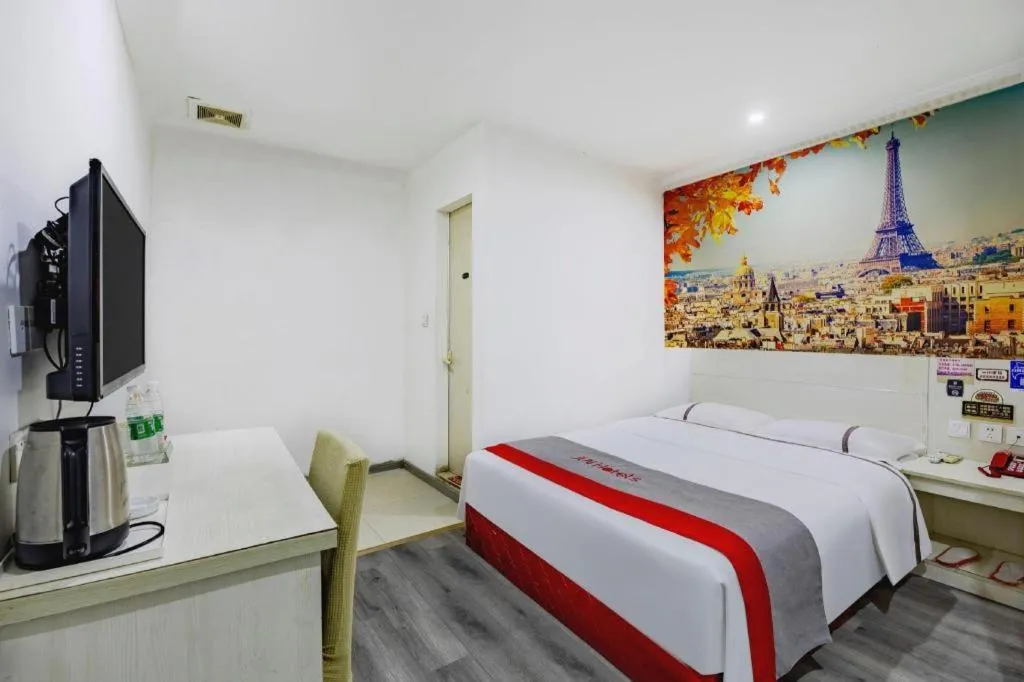 Bed in JUNYI Hotel Jiangxi Xinyu Baoshi Park