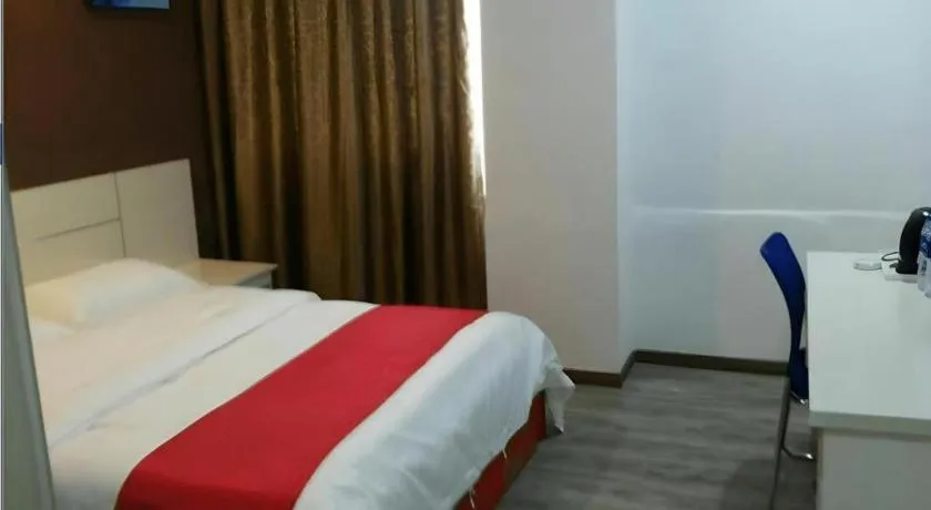 Bed in JUNYI Hotel Jiangxi Xinyu Baoshi Park