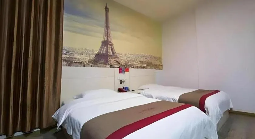 Bed in JUNYI Hotel Jiangxi Xinyu Baoshi Park