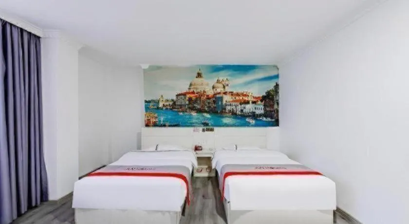 Bed in JUNYI Hotel Jiangxi Xinyu Baoshi Park